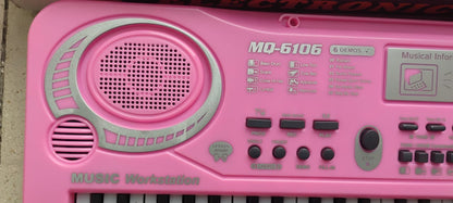 ORGANETA ROSADA 61 TECLAS + USB + MICRÓFONO